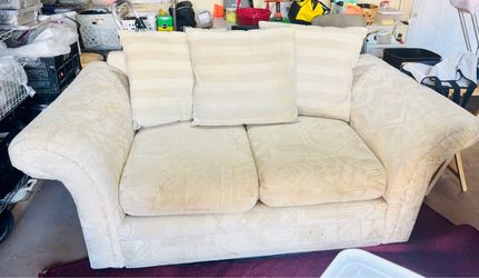 Cream loveseat