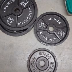 Two 300lb sets Olympic plates 45,35,25,10,5,2.5. Also available  Bar and weight tree,or package deal for everything
