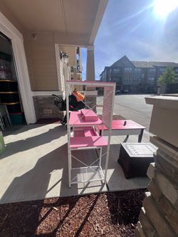 Pink and white gaming desk