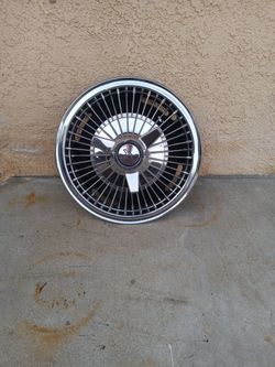 13 In. Spoke Rim Hub Cap Off A 1963 Chevy Nova.