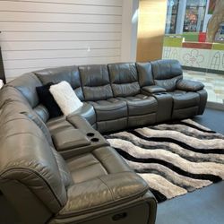 GRAY RECLINING SECTIONAL ONLY $ 1499