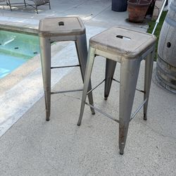 Two outdoor barstools