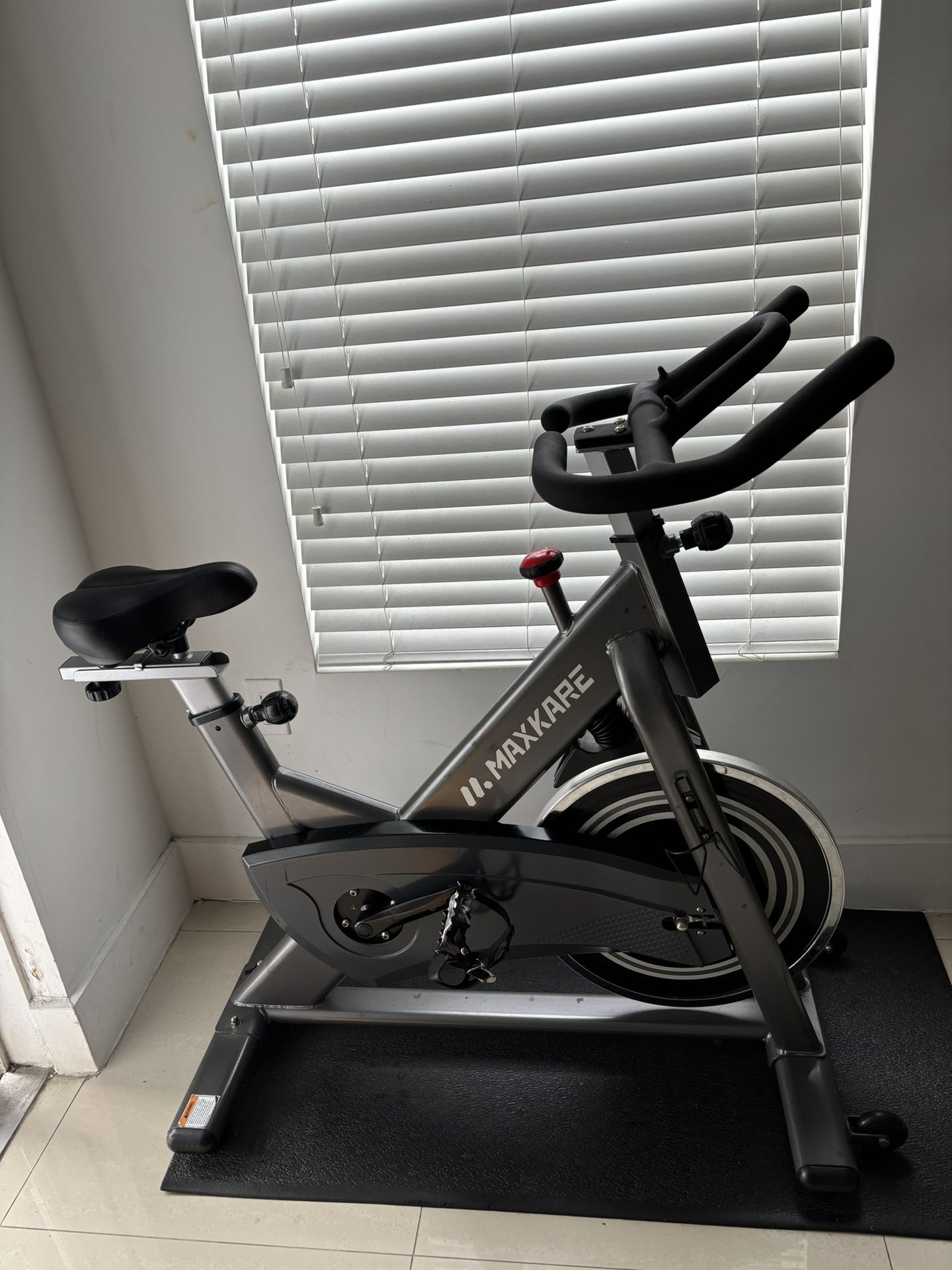 MaxKare Indoor Cycling Exercise Bike with Floor Mat