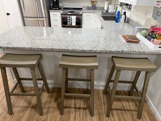 Three Wood Barstools $75 (27 inch size)