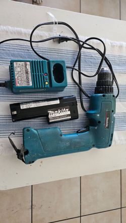 Makita drill, charger and battery