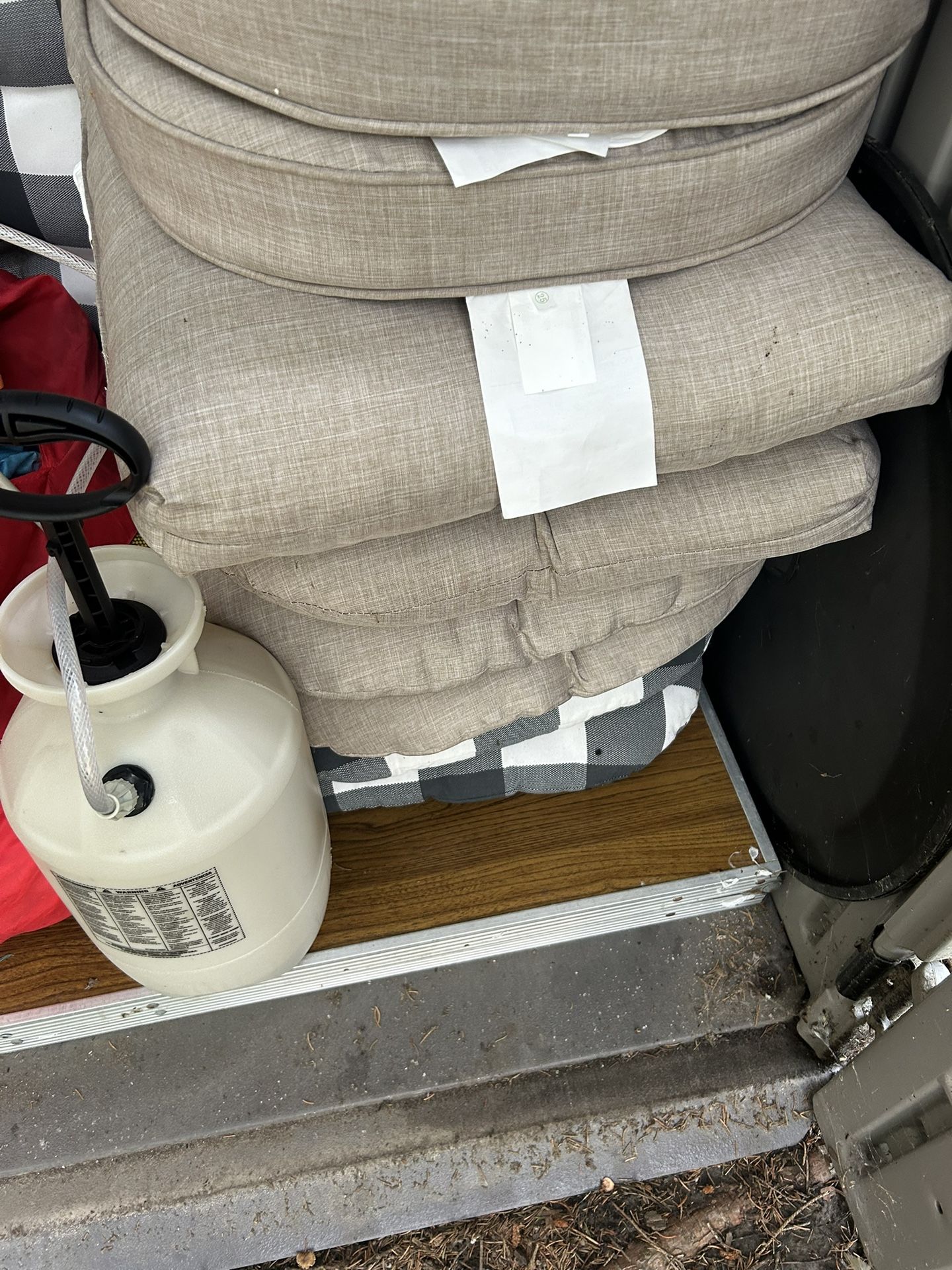 Assortment Of Outdoor Pillows And Cusions