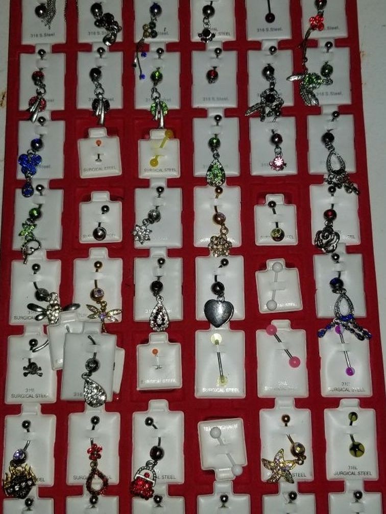 Collection of Belly rings, some tongue, some lip
