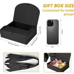 4 black boxes with ribbon