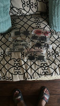 9 Pairs Of Sunglasses All Different Colors 