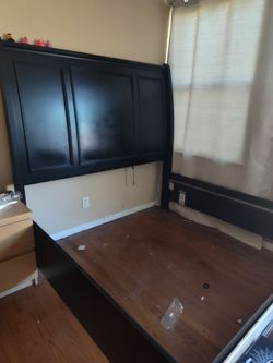 Black wooden bed frame