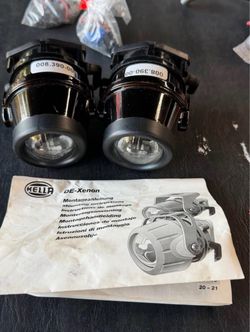 Brand new Hella Micro De xenon driving lights