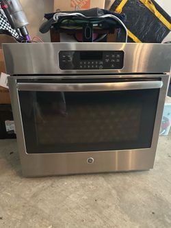 GE JT3000SF in wall stove. Requires new fan.