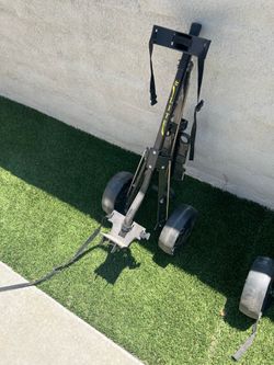 Walking golf kart.