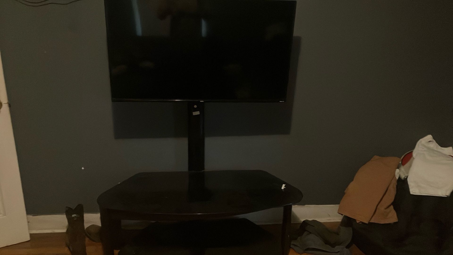 Smart Roku TV with TV stand wooden glass