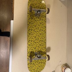 Skateboard with yellow art