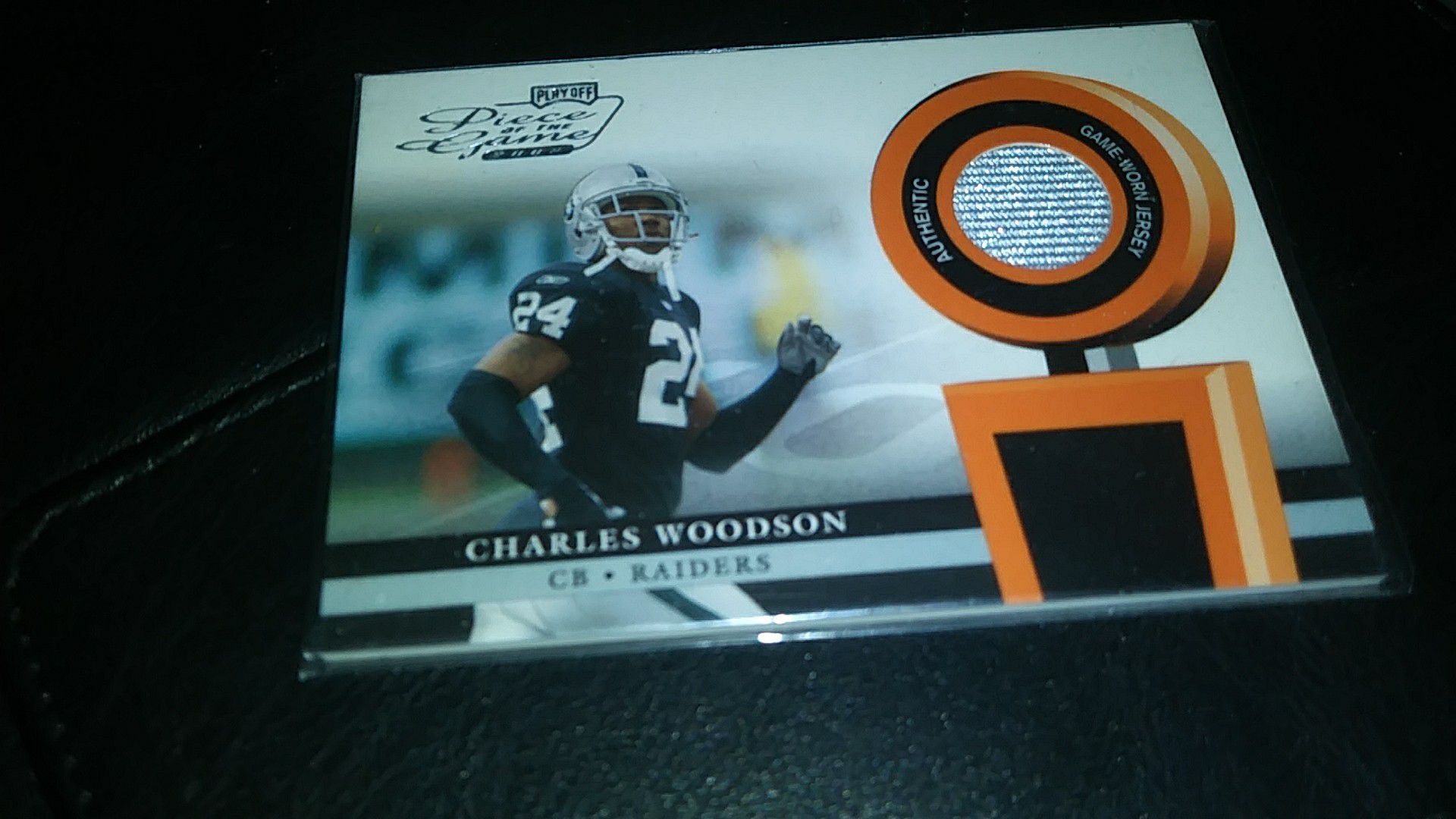 Charles Woodson Oakland Raiders 2002 playoff piece of the game Denny's jersey card