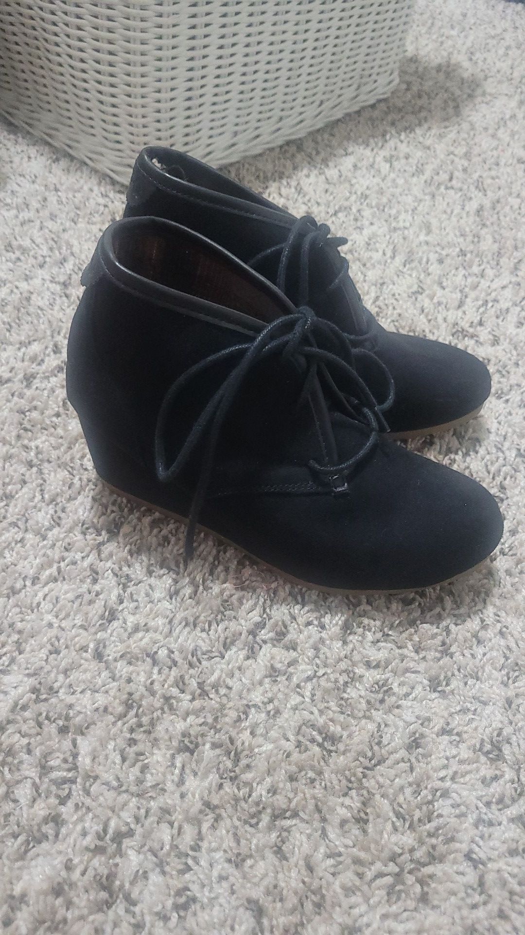 Black wedge booties