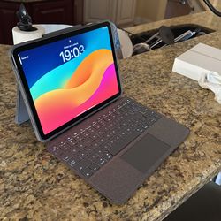 Apple iPad Air 5th Gen (Latest) W/$200 Logitech Slim Case And Backlit Keyboard Mint