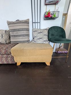 Yellow ottoman used condition (stains spots on top)