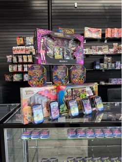 Pokemon tins and cards