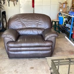 Leather reclining loveseat