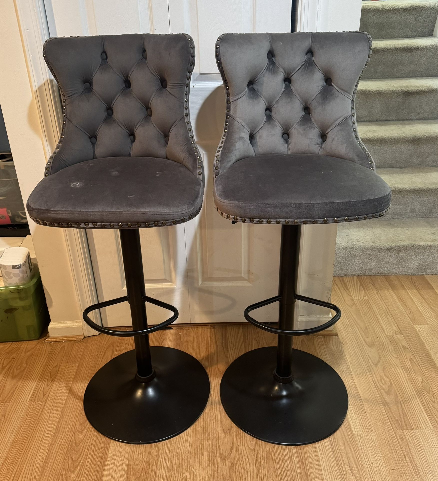 Pair of Gray Swivel Velvet Adjustable Barstools