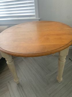 Dining table  with  leaf extension and four chairs