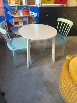 Children's table with two chairs