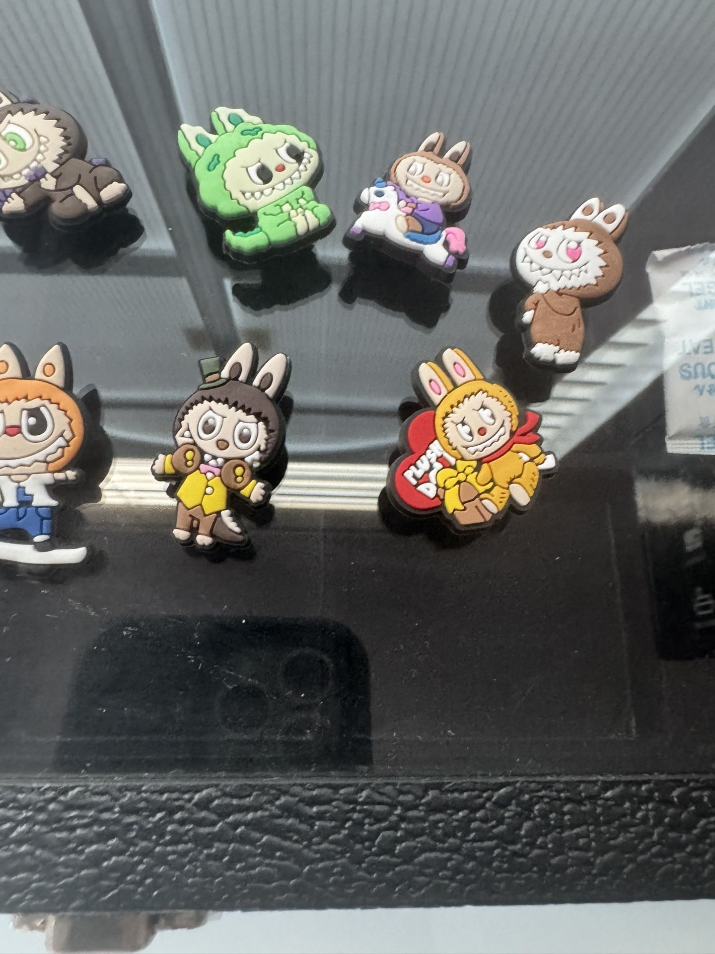 LAbubu croc charms seven included in the bundle