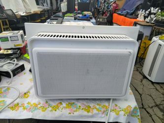 Air conditioner and car speakers