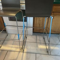 Tall Metal New Chairs   15 each