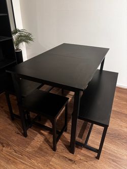Extendable dining room table with benches