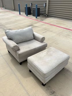 Grey armchair and ottoman