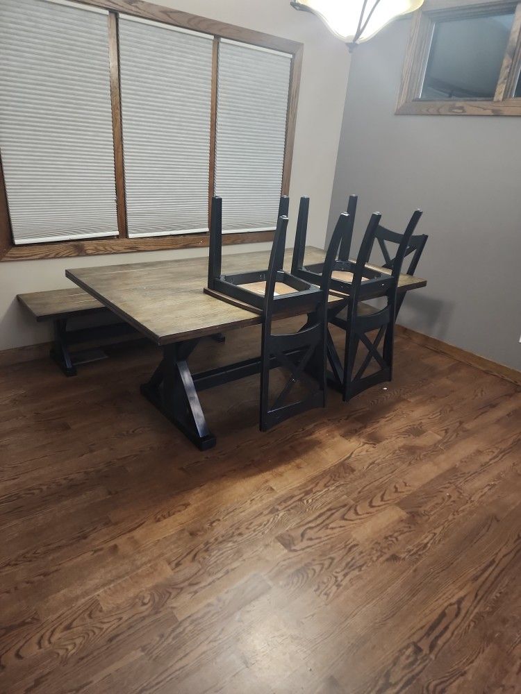 Wood table with 4 chairs and bench