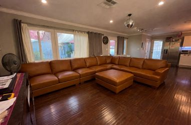 Large Genuine Leather Match Sectional + 2 Ottomans
