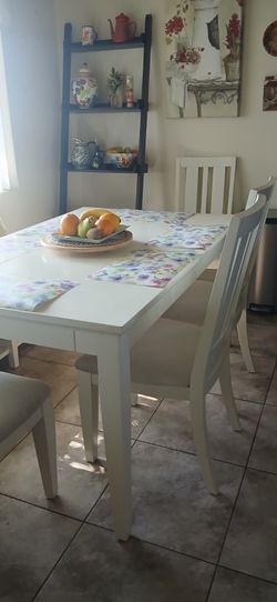 Dining table with 4 chairs and a bench