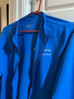 3 Royal Blue Medical City uniform tops and 1 jacket