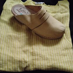 Yellow stripe linen shirt and yellow clogs.