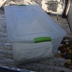 A STERILITE CLEAR STORAGE BOX 32-1/8” INCH LONG 19”-1/8” INCH WIDE 13-3/4” INCH DEEP $10.00