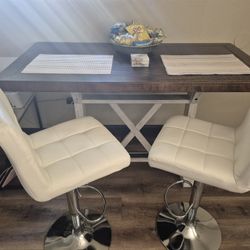 Dinning Table Counter Height Bar Table And (2) Two Stools.