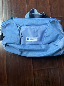 Undefeated Waist and Body Bag