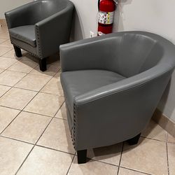 2- Gray Faux Leather Accent Chairs