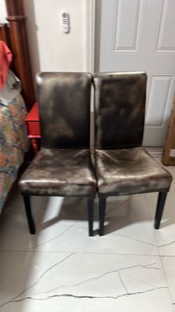 2 dining chairs, both for $15