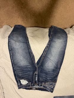 True luck jeans and one black wrangler