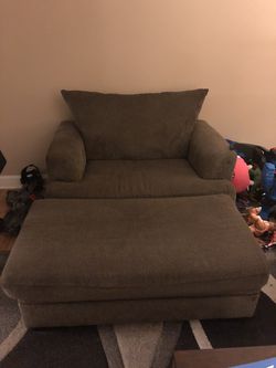 Xtra large chair with ottoman that opens for storage. In great condition