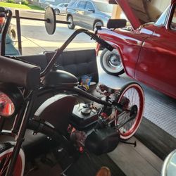 212 PREDATOR MOTOR STARTS RIGHT UP,LIGHTS FRONT AND BACK,FOR SALE OR TRADEEEEEE 