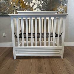 White Storkcraft Petal 4-in-1 Convertible Mini Crib