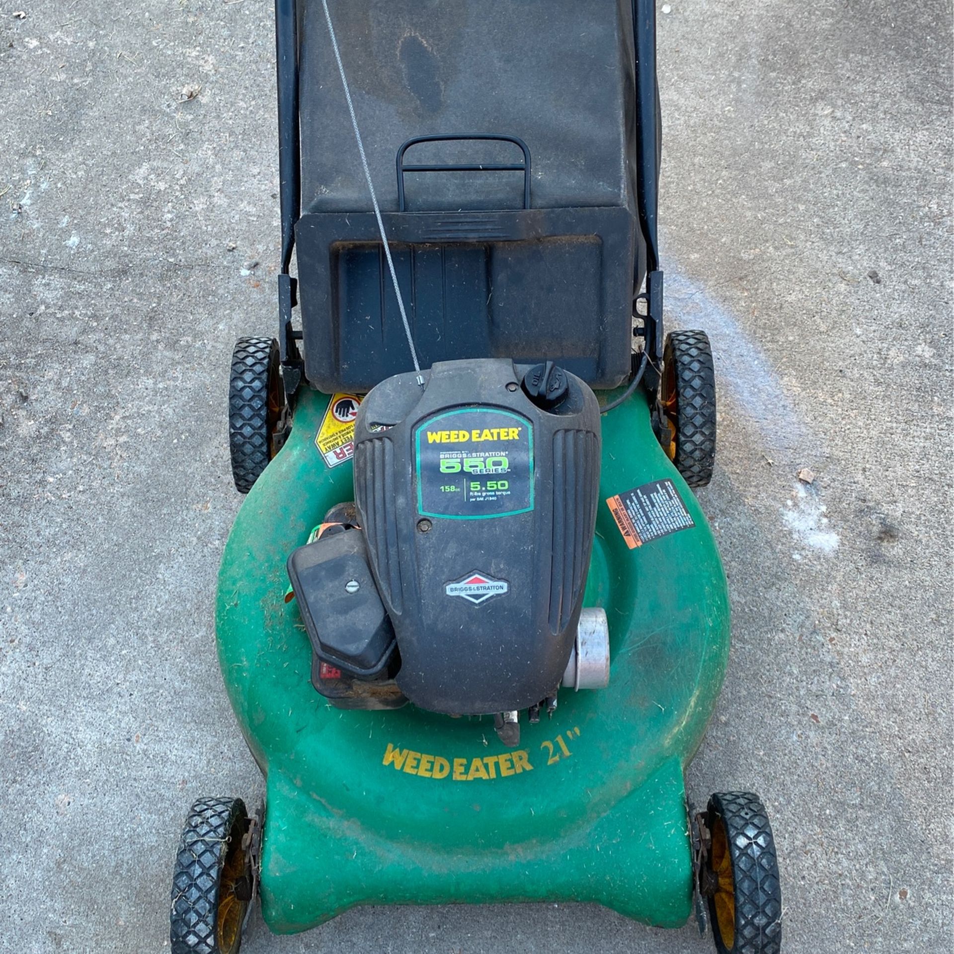 Two Running Lawn Mowers