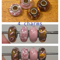 4 unbranded charms