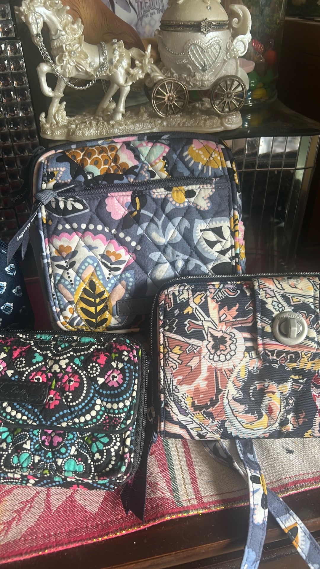 All Vera Bradley wallets $15 each